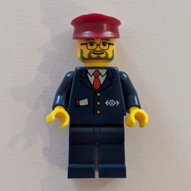 Conductor - Dark Blue Jacket, Dark Blue Legs, Dark Red Hat, Glasses, Beard