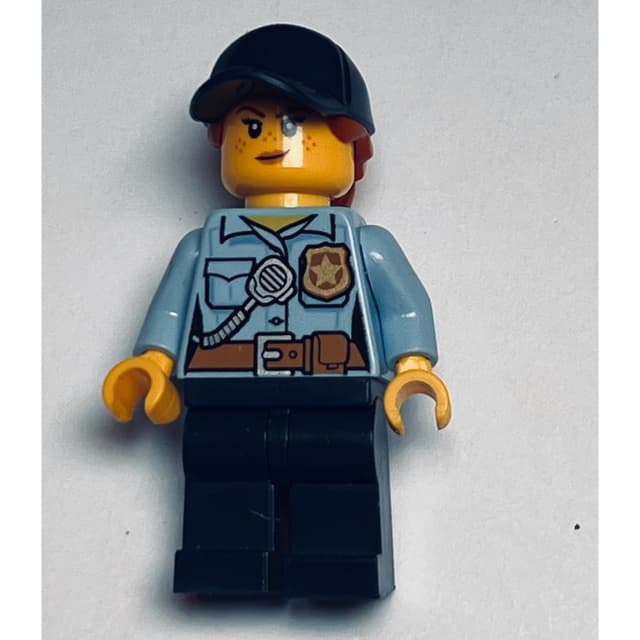 Policewoman, Bright Light Blue Shirt with Radio and Badge, Dark Blue Legs, Dark Blue Cap with Hair, Freckles